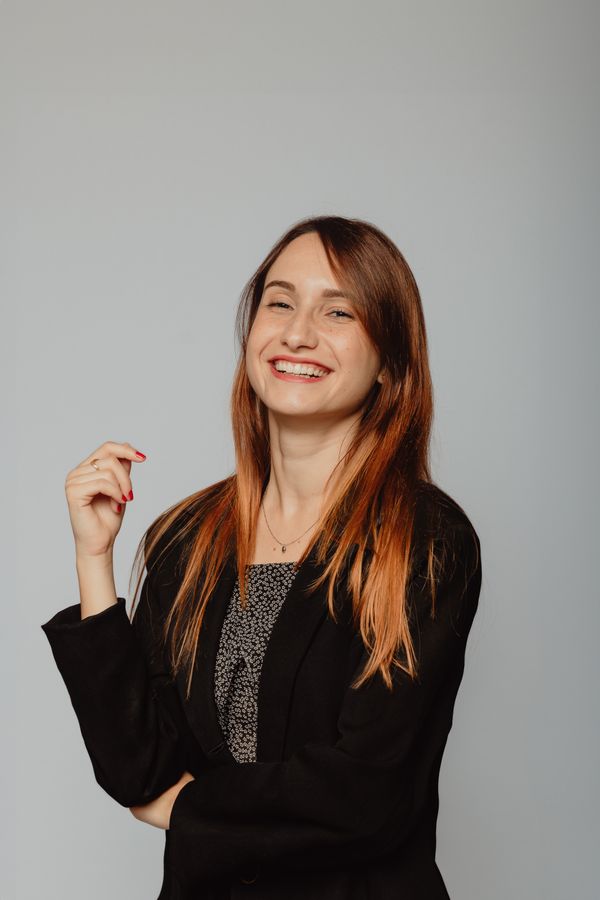 Illustrative stock headshot; not a photograph of the reviewer